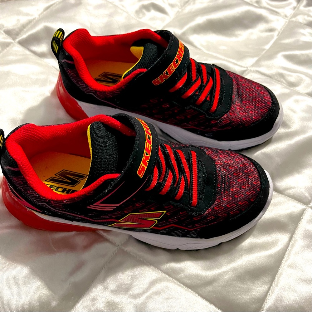 Red and Black Sketchers